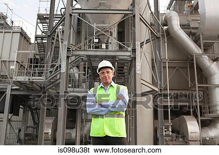 Engineer outside factory View Large Photo Image Stock Photograph - Engineer outside factory. Fotosearch