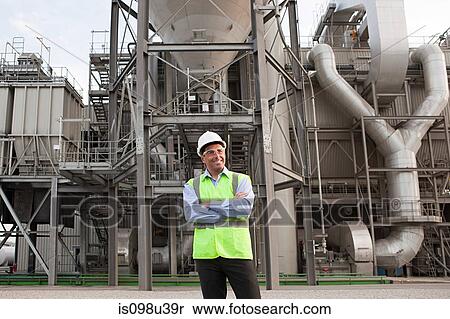 Engineer outside factory View Large Photo Image Stock Photography - Engineer outside factory. Fotosearch