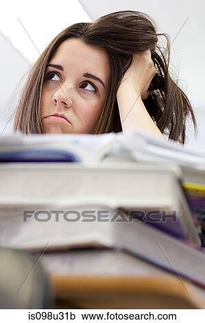 Stock Image - Bored female high school student. Fotosearch