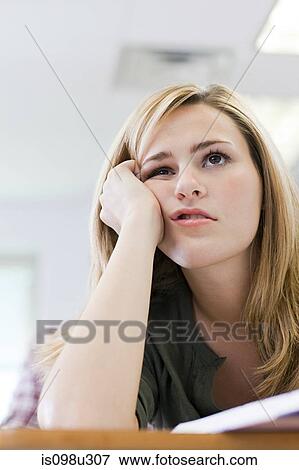 Bored female high school student View Large Photo Image Stock Photo - Bored female high school student. Fotosearch