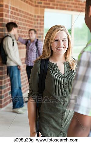 High school classmates chatting View Large Photo Image Stock Image - High school classmates chatting. Fotosearch