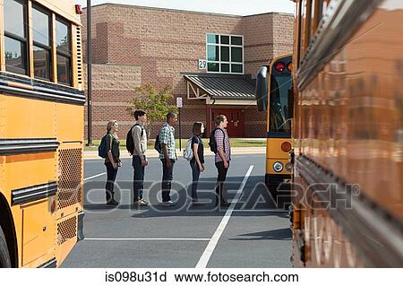 High school students queuing for school bus View Large Photo Image Stock Image - High school students queuing for school bus. Fotosearch