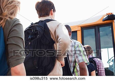 High school students queuing for school bus View Large Photo Image Stock Photography - High school students queuing for school bus. Fotosearch