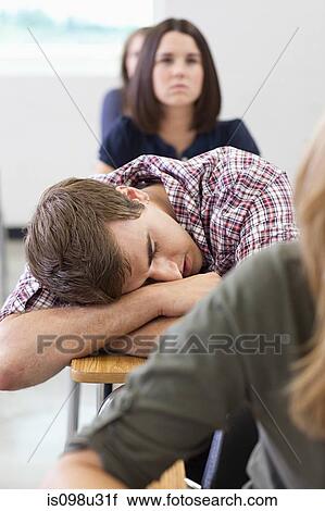 Male high school student asleep in class View Large Photo Image Stock Image - Male high school student asleep in class. Fotosearch