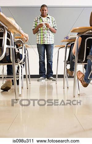 Male high school student giving presentation View Large Photo Image Stock Image - Male high school student giving presentation. Fotosearch