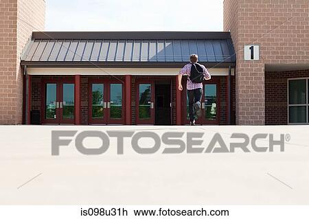 Male high school student running toward school View Large Photo Image Stock Image - Male high school student running toward school. Fotosearch