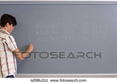 Male high school student writing lines on blackboard View Large Photo Image Stock Photo - Male high school student writing lines on blackboard. Fotosearch