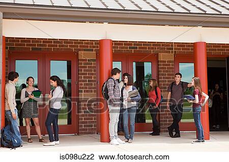 High school students outside school building View Large Photo Image Stock Image - High school students outside school building. Fotosearch