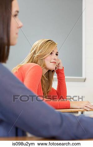 High school students sitting in classroom View Large Photo Image Picture - High school students sitting in classroom. Fotosearch