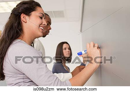 High school students using white board View Large Photo Image Picture - High school students using white board. Fotosearch