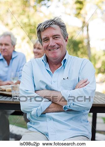 Man at meal outdoors View Large Photo Image Stock Photography - Man at meal outdoors. Fotosearch