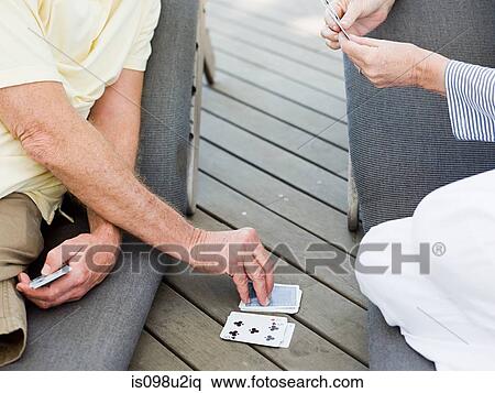 People playing cards outdoors View Large Photo Image Stock Photography - People playing cards outdoors. Fotosearch