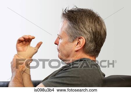 Man with wrist in bandage View Large Photo Image Picture - Man with wrist in bandage. Fotosearch
