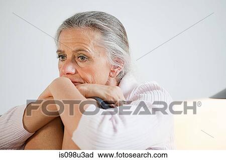 Mature woman looking anxious View Large Photo Image Stock Image - Mature woman looking anxious. Fotosearch