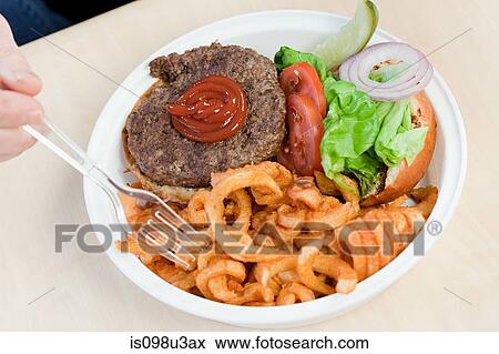 Plate of burger and fries View Large Photo Image Stock Photo - Plate of burger and fries. Fotosearch