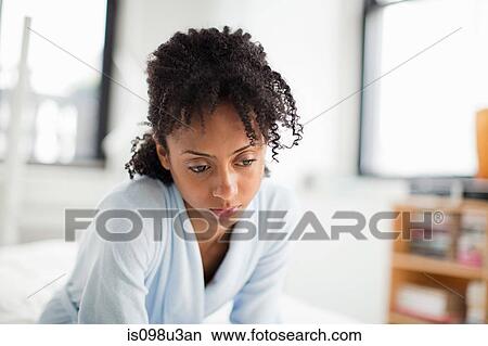 Woman looking depressed View Large Photo Image Picture - Woman looking depressed. Fotosearch