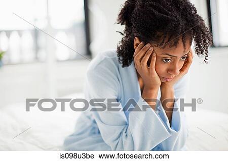 Woman looking depressed View Large Photo Image Stock Image - Woman looking depressed. Fotosearch