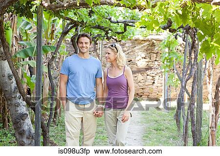 Couple in a vineyard View Large Photo Image Stock Photography - Couple in a vineyard. Fotosearch