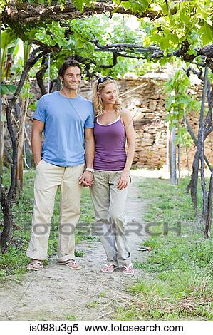 Couple in a vineyard View Large Photo Image Stock Photography - Couple in a vineyard. Fotosearch