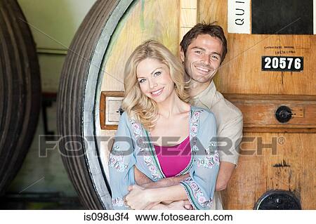Happy couple in a winery View Large Photo Image Picture - Happy couple in a winery. Fotosearch