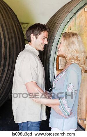 Happy couple in a winery View Large Photo Image Stock Image - Happy couple in a winery. Fotosearch