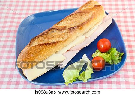 Stock Photography - Baguette with ham and cheese. Fotosearch