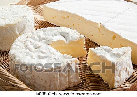 Stock Image - Camembert and brie cheeses. Fotosearch