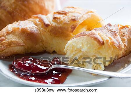 Croissant and jam View Large Photo Image Stock Photo - Croissant and jam. Fotosearch