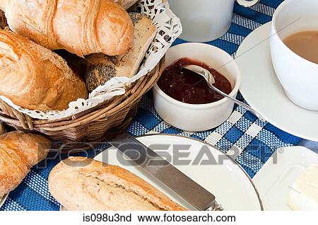 Stock Image - Croissants, bread and jam. Fotosearch