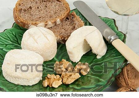 Goats cheese and walnuts View Large Photo Image Stock Photo - Goats cheese and walnuts. Fotosearch