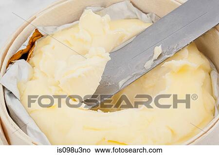 Knife in butter View Large Photo Image Picture - Knife in butter. Fotosearch