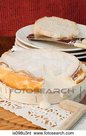 Stock Photograph - Melted vacherin cheese. Fotosearch
