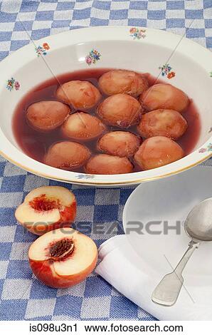 Peaches in syrup View Large Photo Image Stock Image - Peaches in syrup. Fotosearch