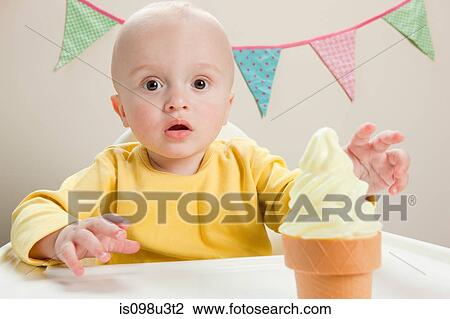 Baby boy reaching for ice cream View Large Photo Image Stock Image - Baby boy reaching for ice cream. Fotosearch