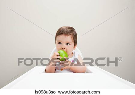 Baby boy with apple View Large Photo Image Picture - Baby boy with apple. Fotosearch