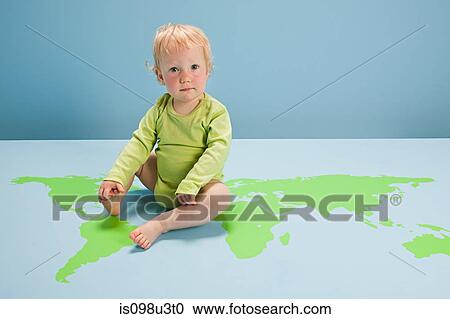Baby girl sitting on world map on floor View Large Photo Image Stock Image - Baby girl sitting on world map on floor. Fotosearch