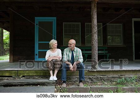 Stock Photo - Mature couple at rural retreat. Fotosearch