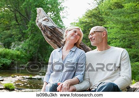 Mature couple outdoors in rural scene View Large Photo Image Stock Image - Mature couple outdoors in rural scene. Fotosearch