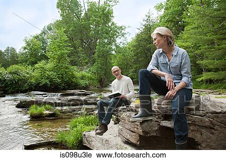 Mature couple outdoors in rural scene View Large Photo Image Stock Image - Mature couple outdoors in rural scene. Fotosearch