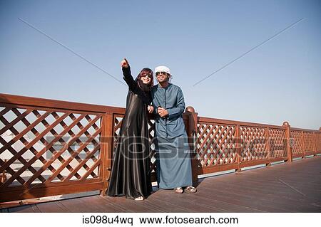 Middle Eastern people and fence, outdoors View Large Photo Image Stock Photography - Middle Eastern people and fence, outdoors. Fotosearch