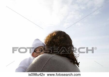 Baby and mother outdoors View Large Photo Image Stock Photo - Baby and mother outdoors. Fotosearch