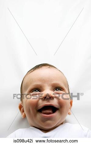 Stock Image - Baby boy laughing. Fotosearch