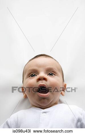 Baby boy yawning View Large Photo Image Stock Image - Baby boy yawning. Fotosearch