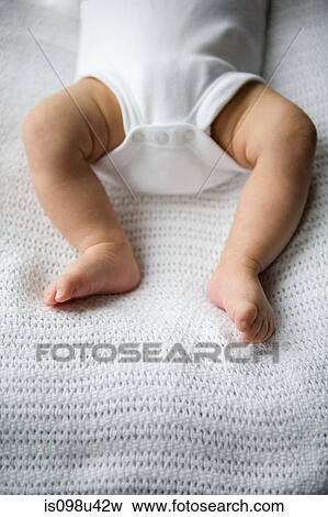 Baby legs View Large Photo Image Stock Photo - Baby legs. Fotosearch