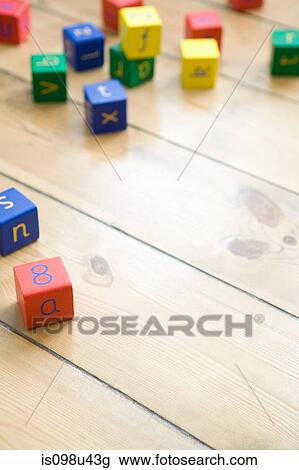 Building blocks on wooden floor View Large Photo Image Stock Image - Building blocks on wooden floor. Fotosearch