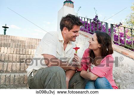 Stock Image - Young romantic couple on holiday. Fotosearch