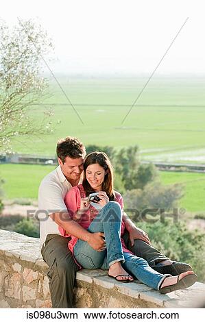 Young romantic couple with camera View Large Photo Image Picture - Young romantic couple with camera. Fotosearch