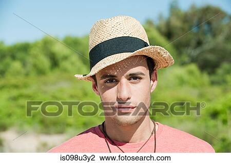 Teenage boy wearing hat, portrait View Large Photo Image Stock Image - Teenage boy wearing hat, portrait. Fotosearch