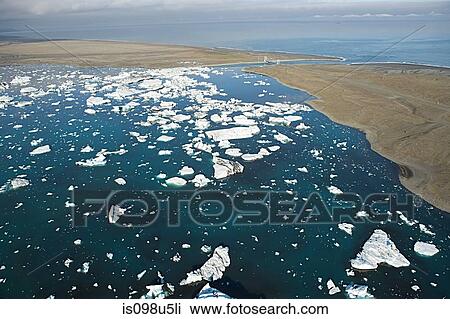 Iceland, icebergs in jokulsarlon lagoon drifting from vatnajokull glacier into the north atlantic ocean View Large Photo Image Stock Image - Iceland, icebergs in jokulsarlon lagoon drifting from vatnajokull glacier into the north atlantic ocean. Fotosearch