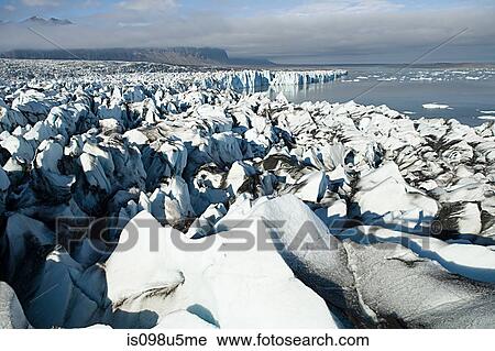 Iceland, icebergs in jokulsarlon lagoon drifting from vatnajokull glacier into the north atlantic ocean View Large Photo Image Stock Image - Iceland, icebergs in jokulsarlon lagoon drifting from vatnajokull glacier into the north atlantic ocean. Fotosearch